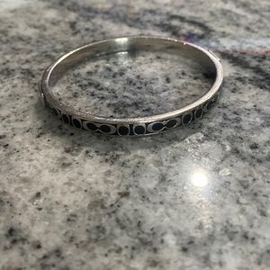 Cute silver tone coach bracelet